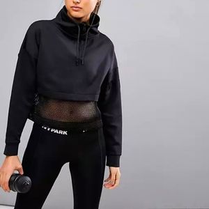 IVY PARK Black Cropped Pullover Hoodie with Mesh Panel